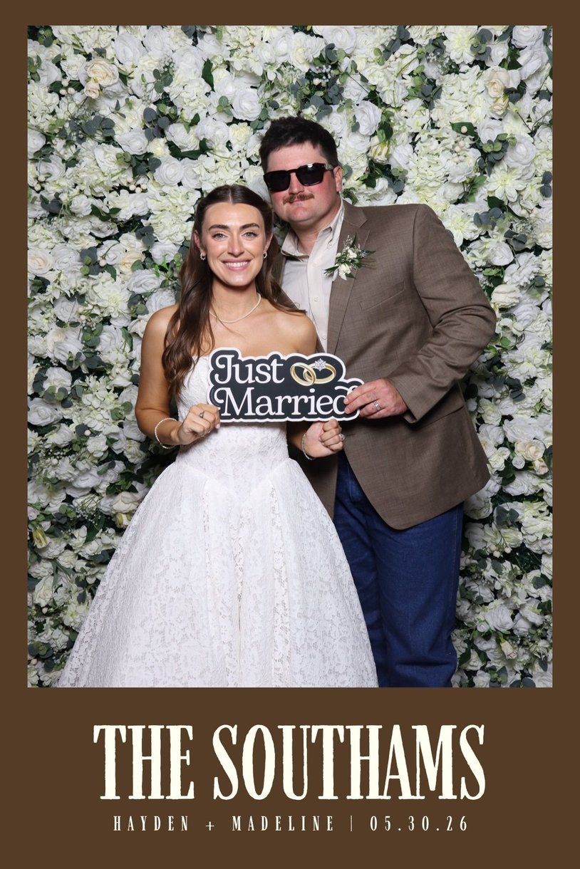 A The Southams wedding print of the couple with a Just Married sign